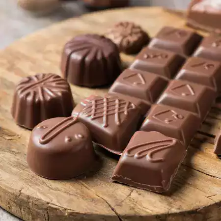 Classic rectangular chocolate bars in six cocoa percentages from 55 to 85 percent made at ChocoNature Bangalore workshop